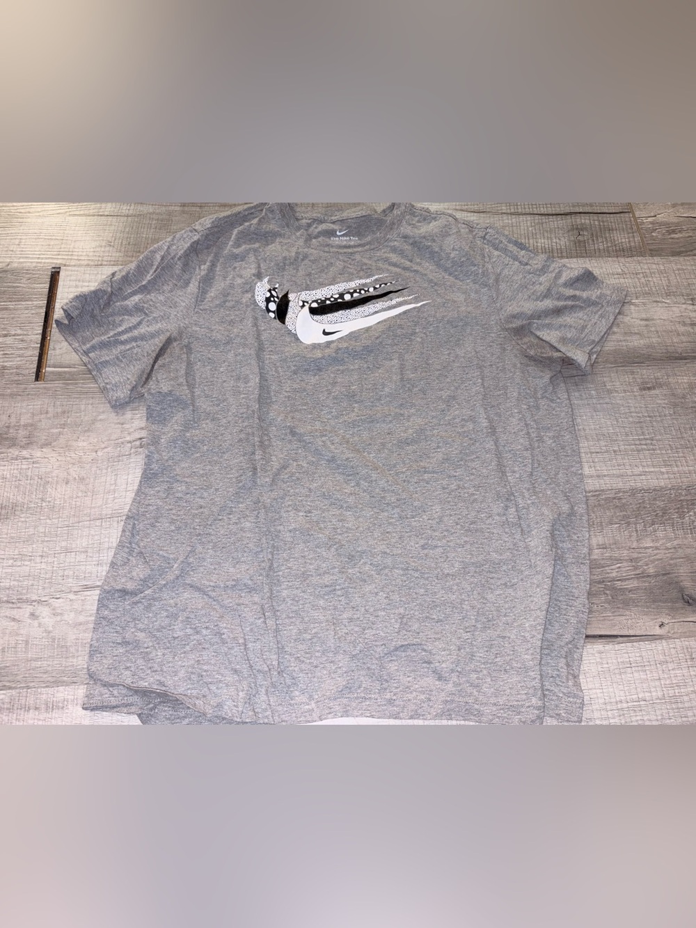The Nike Tee triple swoosh
